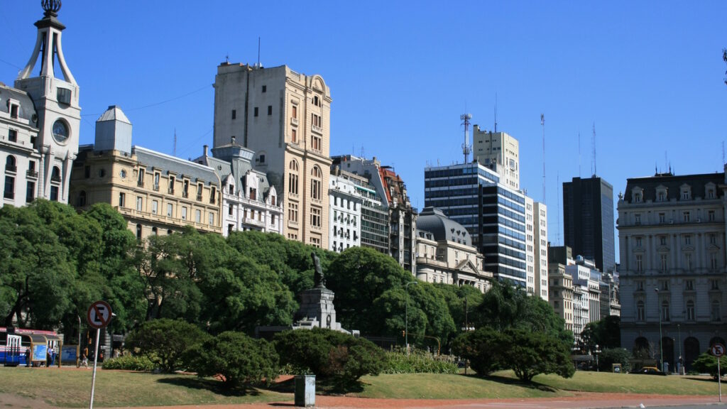 Buenos Aires skyline with historic and modern buildings and green park in Argentina.
