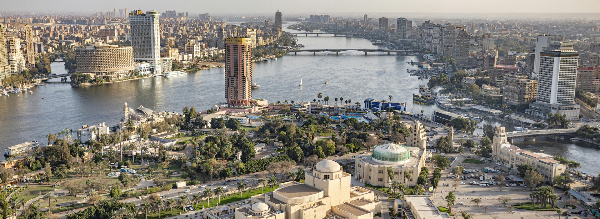 Cairo skyline with Nile River and bridges in Egypt cityscape view.