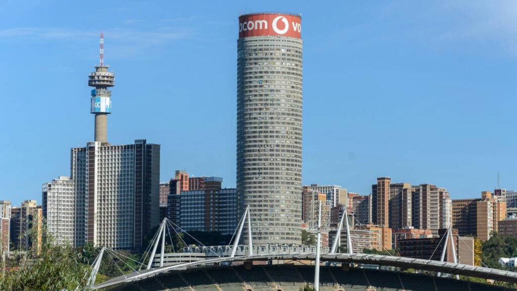 Skyline of Johannesburg South Africa with Ponte City Tower and Hillbrow Tower.
